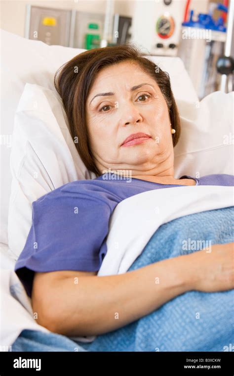 Patient Lying In Hospital Bed Stock Photo Alamy