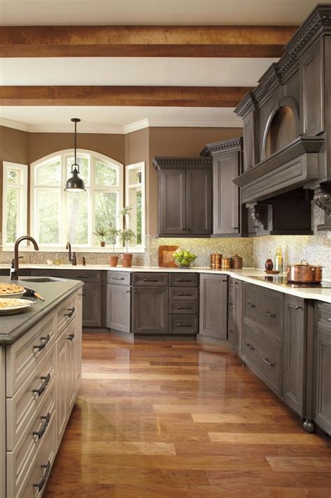 Pairing a stain with a painted cabinet is a wonderful way to mix a modern look and feel into the more traditional. Contemporary and Traditional Kitchen Designs | | Founterior
