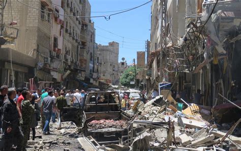 Twin Blasts Near Damascus Kill 12 Wound Dozens Bloomberg