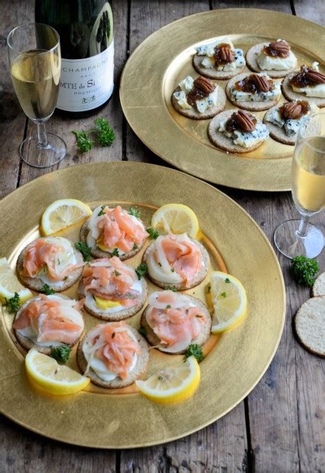 Get your party off to a stylish start with our tempting canapé recipes, including cheese and rosemary sablés, smoked salmon and dill blinis and spiced pea soup shots. A Duet of Christmas Canapés and Champagne - Lavender and ...
