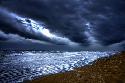 Angry Sky Peaceful Sea Photograph By Cecil Fuselier Fine Art America