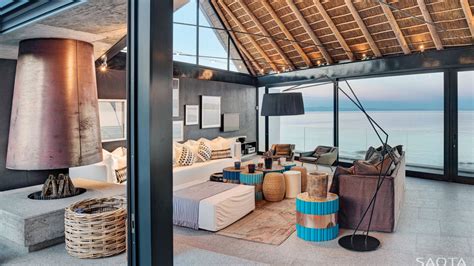 Thatched Roof Beach House With Outdoor Entertaining Spaces