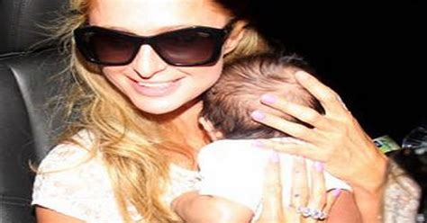 Paris Hilton Cradles Adorable Newborn Baby As She Arrives In La Ok