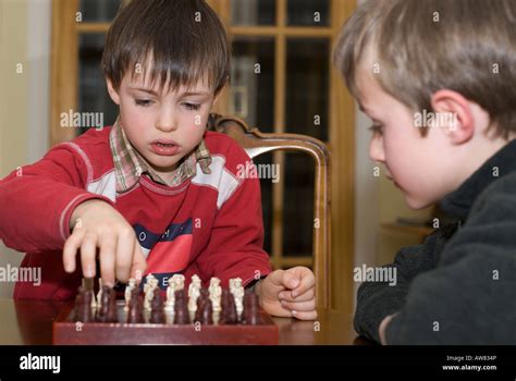 Boys Playing Chess Stock Photo Alamy