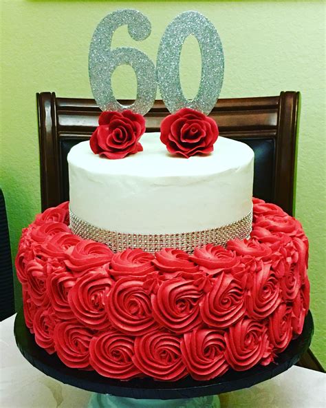And one more year passed now, so it's better. 60th Birthday Cake, buttercream, red and silver, rosettes ...