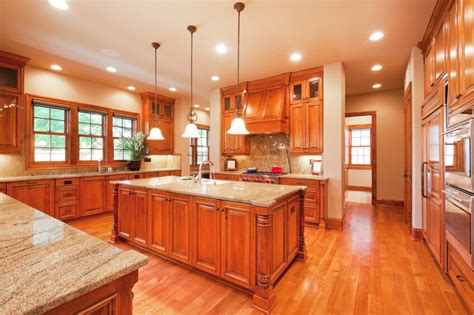 While choosing a matching wood floor for your light maple cabinets may seem like an obvious choice, you can also opt to give your kitchen added dimension by mixing wood tones. 52 Enticing Kitchens with Light and Honey Wood Floors ...