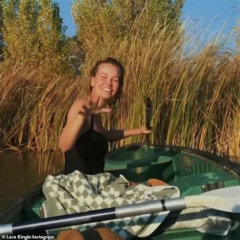 Lara Bingle Sizzles In A Black Swimsuit As She Goes Canoeing During Sun