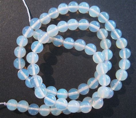 Beautiful Blues In This Strand Of Australian Opal Beads Available In