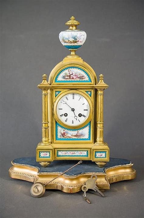 Doulton lambeth faience floral mantel clock. Empire style French ormolu & porcelain mantel clock ...