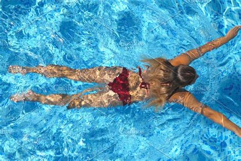 Unrecognizable Beautiful Girl Floating Across The Pool Of Hotel Young Woman High Quality