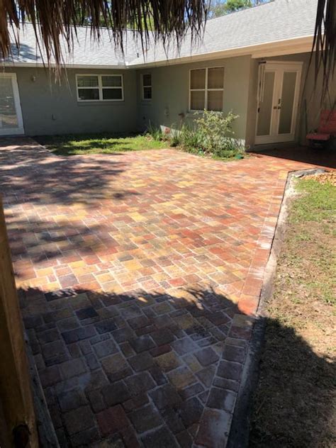 Pavers come in various combinations of colors, styles, sizes, thicknesses, patterns, and textures. Square Paver Patio | Father & Son Landscaping, LLC