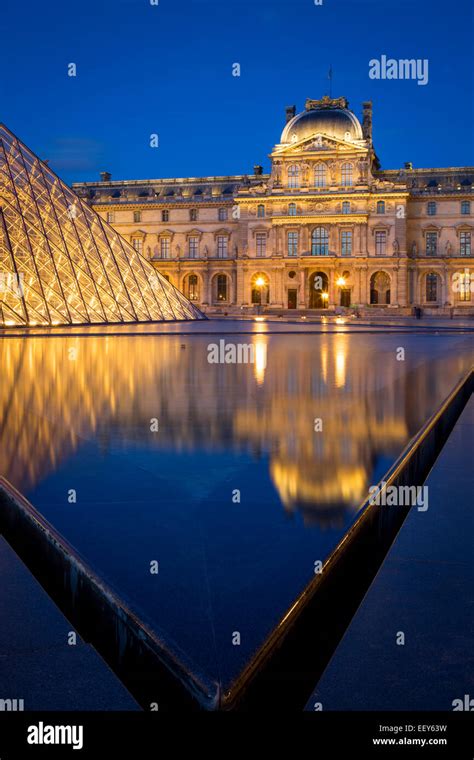 Twilight In The Courtyard Of Musee Du Louvre Paris France Stock Photo