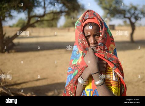 Fulani Women Gathering Water From A Hole In The Sahel Burkina Faso