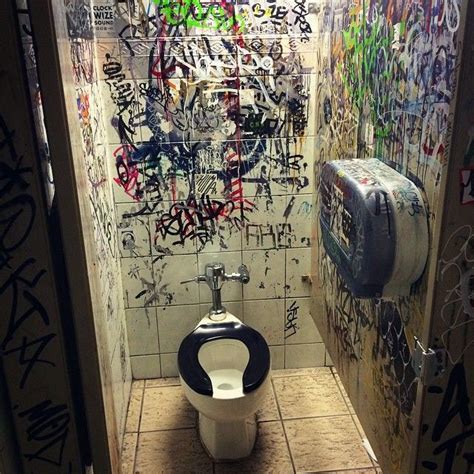 the walls of the mens room stalls at sneaky dee s bathroom graffiti toilet art easy bathroom