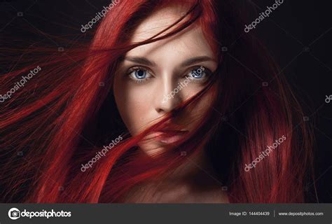 sexy beautiful redhead girl with long hair perfect woman portrait on black background gorgeous