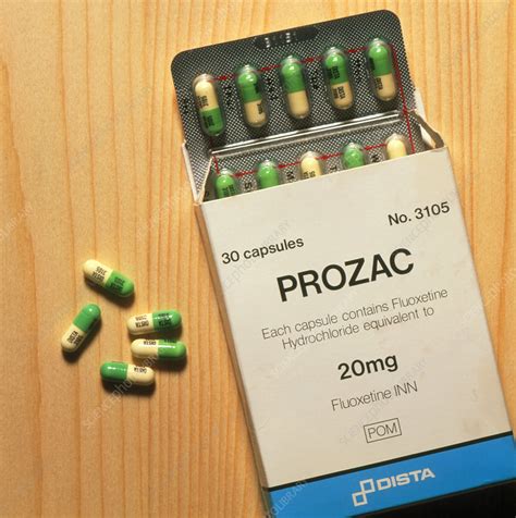 Prozac Pack With Pills On Wooden Surface Stock Image M6300062