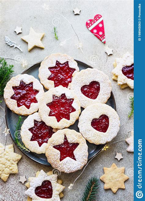 Traditional austrian jam cookies | leslie the foodie. Plate With Christmas Or New Year Shortcrust Cookies With Red Jam. Traditional Festive Austrian ...