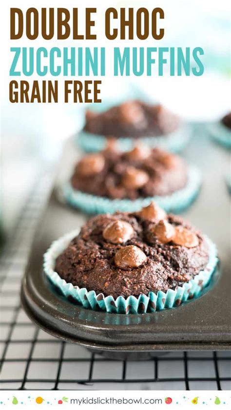 Double Choc Zucchini Muffins With Chocolate Chips In The Middle On A