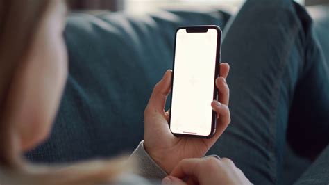 Over Shoulder Shot Of Woman Holding Mobile Stock Footage Sbv