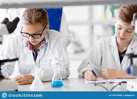 Kids Studying Chemistry At School Laboratory Stock Photo Image Of