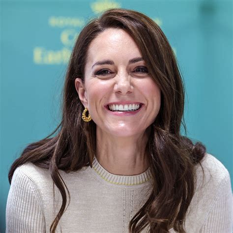 Kate Middleton Rocks A Form Fitting Sweater Dress And Green Coat In