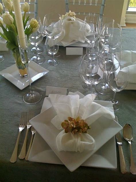 Folded napkin to the right of the plate, knife and spoon on top of it (knife closest to the plate), fork on the left side. 910 best images about Table Settings on Pinterest