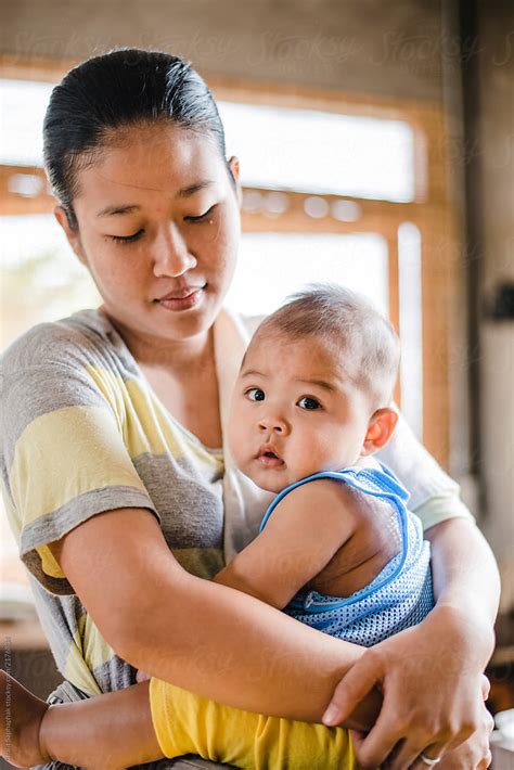 Asian Mother And Her Son By Stocksy Contributor Chalit Saphaphak