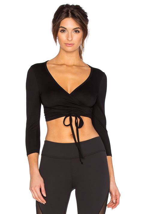 4 pieces basic crop tank tops sleeveless racerback crop sport top for women. Beyond yoga Heathered Wrapped 3/4 Sleeve Crop Top in Black ...