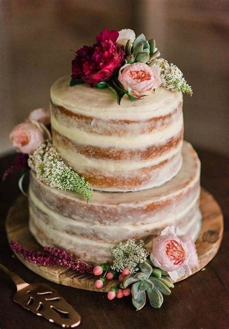 Say i do! to one of these amazing wedding cake ideas! Two tier half iced wedding cake with flowers | Simple ...