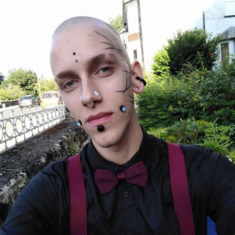 Punkerskinhead Handsome Shaved Tattooed And Pierced Guy