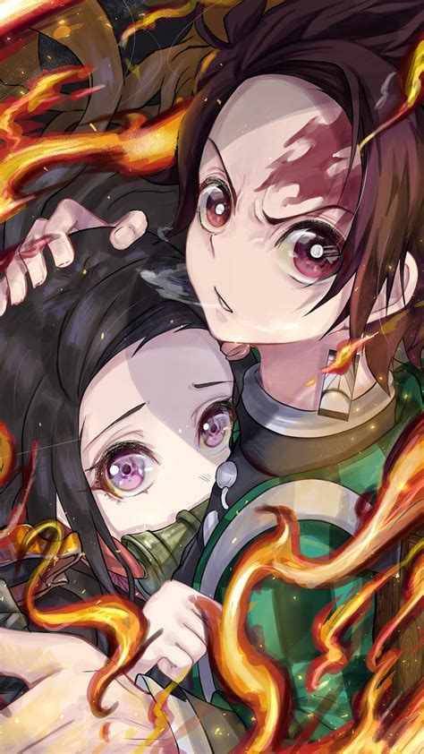 Download Tanjiro And Nezuko Protect Flames Wallpaper