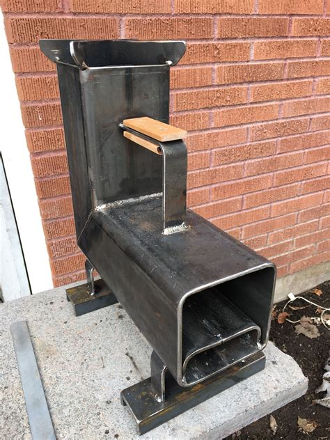 A secondary pipe made of galvanized steel pipe comes from back of the stove and comes across the the axle is passed through a square metal box which is bolted using a bearing on both sides. Pin on Wood stoves