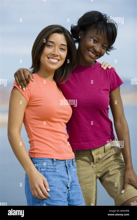 Portrait Of Two Young Women Smiling Stock Photo Alamy