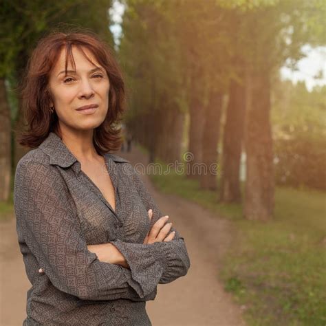 beautiful mature woman in summer park stock image image of adult face 125251691