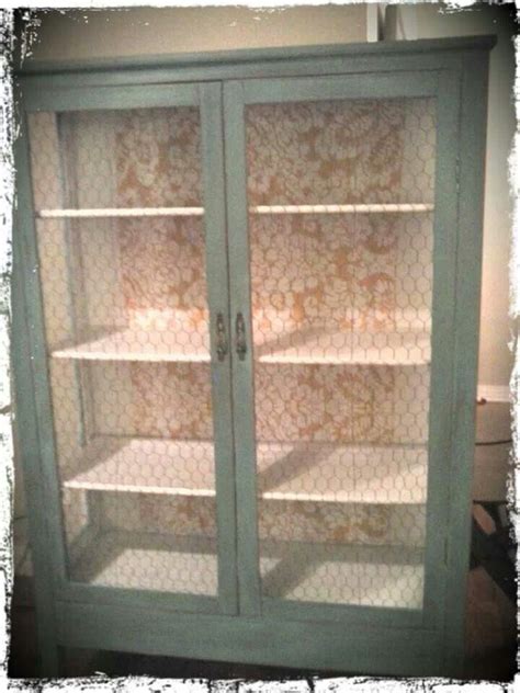 After i painted the kitchen cabinets teal last year. Cabinet with chicken wire doors | Diy kitchen cabinets ...