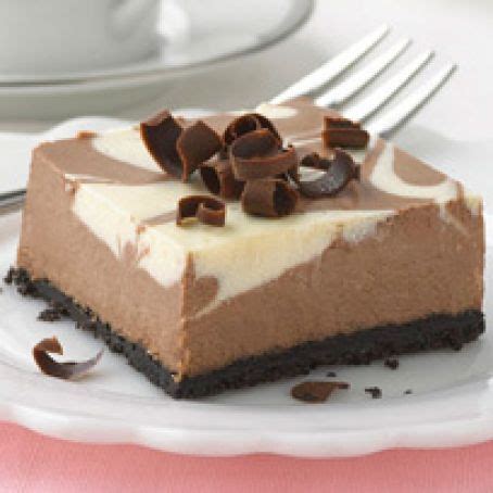 Buttery graham cracker crust, dense and creamy cream cheese filling, and tart and tangy sour cream topping. Philadelphia Chocolate Vanilla Swirl Cheesecake Recipe - (4.4/5)