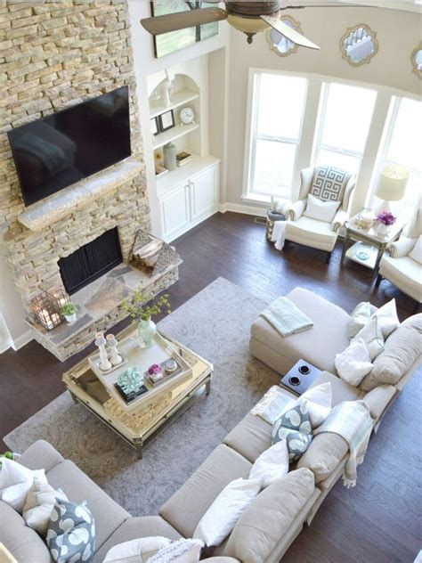 Get started laying out your living room by browsing living room furniture, and for more inspiration check out these posts i'm not sure if i'm going to put the sofa with a matching wide chair and a wing back chair with different fabric in the corner or a sofa with two different chairs facing the sofa. Sectional and two chairs by window | Elegant living room ...