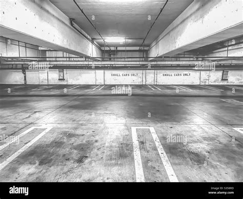 Empty Underground Parking Lot In Black And White Stock Photo Alamy