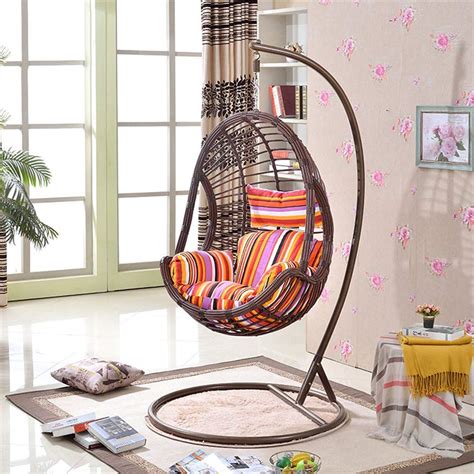 Wicker Egg Schair Hammock With Stand In Living Room With Colorful