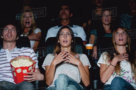 Audience In Movie Theater With Shocked Expressions Stock Photo Dissolve