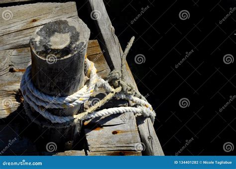 Sailor Rope And Knot On A Wooden Pier At The Seaside Black Backgound