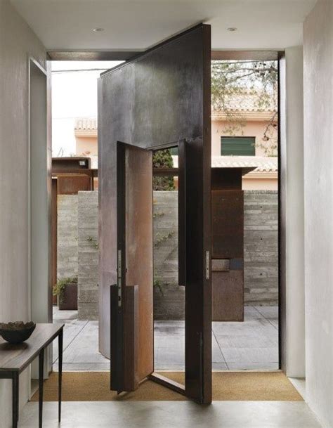The home's welcoming front entrance. Door designs: 40 modern doors perfect for every home ...