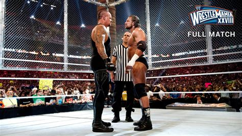 The Undertaker Vs Triple H Lucha En Celda Infernal Fin De Una Era