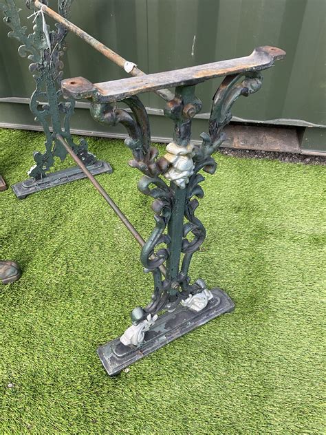 Pair Of Ornate Cast Iron Table Bases And One Cast Iron Pub Table Base