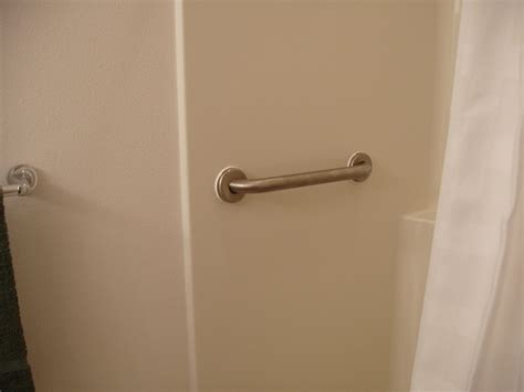 Staying At Home Installing Grab Bars In Fiberglass Showers