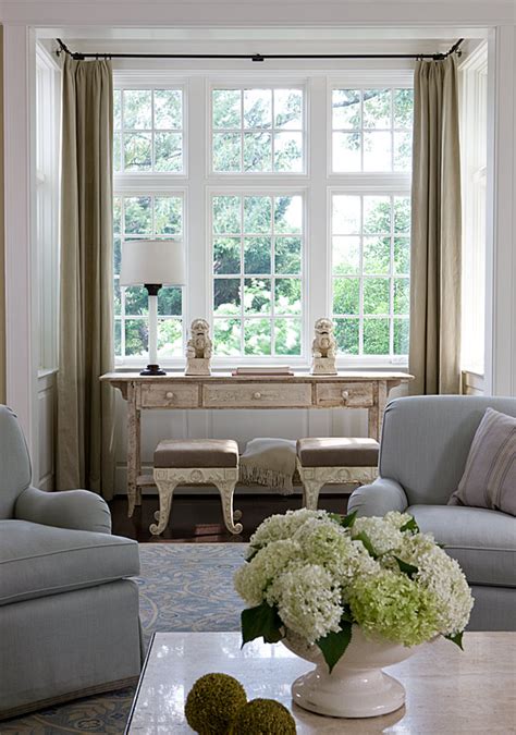 Just be sure to leave a gap of about 10 to 12 inches to give the piece some breathing room and to allow for window treatments. Things We Love: Console Tables - Design Chic