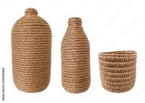 Foto De Pots Wrapped And Basket Knitted From Jute Thread Isolated On A