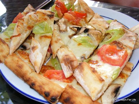 This unique location combined with the anatolian and south east of turkey's cuisine is known for its kebabs (grilled meat in turkish). Turkish Food - Pide • Turkey's For Life