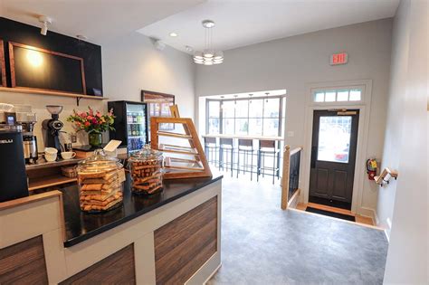 The distributrice reinvents the takeout coffee service by taking over the smallest commercial space in montréal. THE COFFEE ROOM, NEWTOWN, PA | down2earth Interior Design