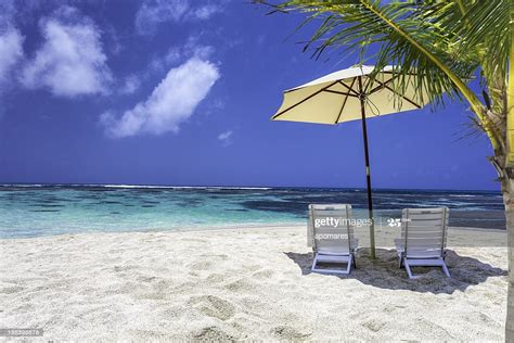 Relaxing Tropical Caribbean Island Beach Umbrella And